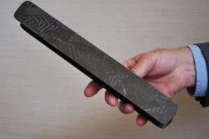 An I-beam made of reused carbon fiber scraps.