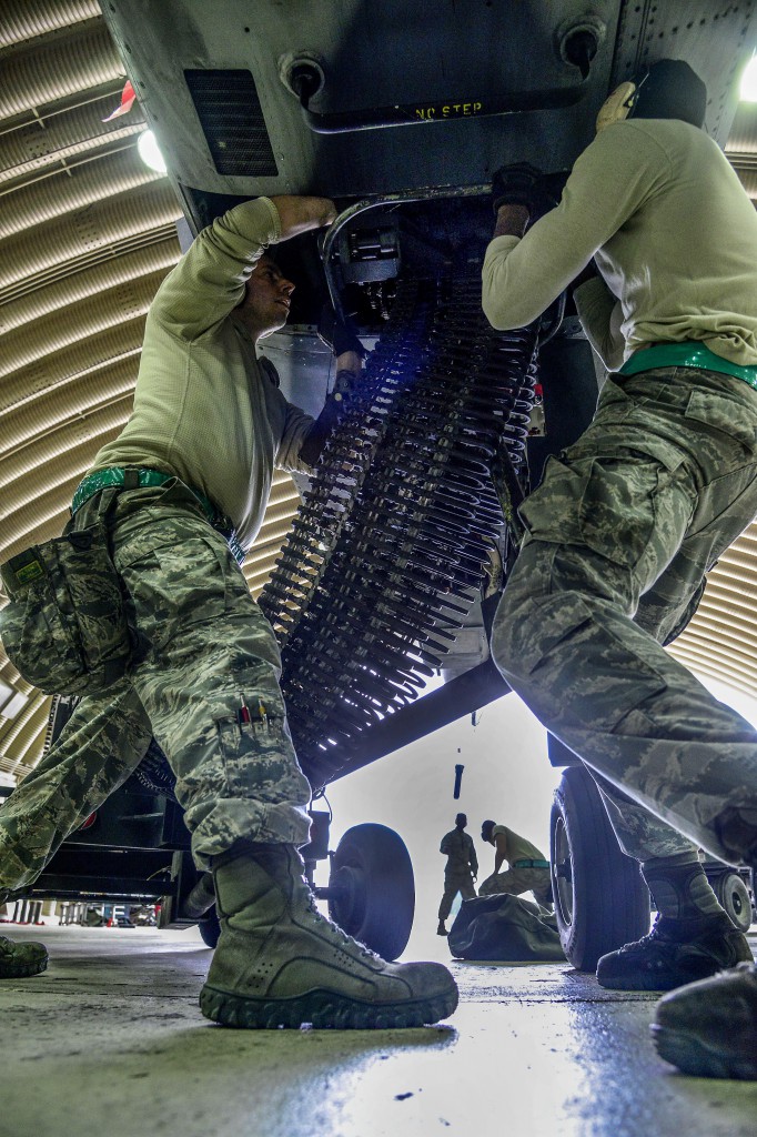 Staff Sgt.Woodrow Walkup and Senior Airman Kameron Whitener, 25th Aircraft Maintenance Unit weapons load crew team members, prepare to load 30 millimeter rounds onto an A-10 Thunderbolt II during the Vigilant Ace 16 exercise on Osan Air Base, Republic of Korea, Nov. 1, 2015. The A-10 is a highly accurate and survivable weapons-delivery platform, capable of carrying up to 16,000 pounds of munitions including the 30 millimeter cannon which can penetrate tanks. (U.S. Air Force photo by Senior Airman Kristin High/Released)