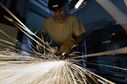 Master Sgt. Jim Vlacich, a machinist with the 106th Rescue Wing metal technologies shop, grinds down a section of metal at Francis S. Gabreski Air National Guard Base, N.Y., Aug. 6, 2015. Aircraft metals technology specialists are responsible for machining parts, welding, creating items from scratch and welding parts necessary for keeping the 106th RQW’s aircraft flying. (U.S. Air National Guard photo/Staff Sgt. Christopher S. Muncy)