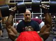 Tech. Sgt. David, a 432nd Maintenance Group contract officer representative, performs chest-fly repetitions while his trainer, Derrick Chandler, motivates him during a workout Dec. 4, 2015, at Nellis Air Force Base, Nev. David recently attained his International Federation of Bodybuilding and Fitness professional card, which allows him to compete in professional bodybuilding competitions. (U.S. Air Force photo/Airman 1st Class Christian Clausen)