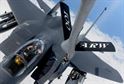 A KC-135 Stratotanker from the 100th Air Refueling Wing refuels an F-15E Strike Eagle from the 48th Fighter Wing Nov. 12, 2015, over the northern Mediterranean. While deployed to Incirlik Air Base, Turkey, both wings will work together in support of Operation Inherent Resolve and counter-Islamic State of Iraq and the Levant operations in Iraq and Syria. (U.S. Air Force photo/Senior Airman Kate Thornton)