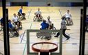 Members of the 10th Expeditionary Airlift Evacuation Flight and 721st Aircraft Maintenance Squadron tip off during a Wounded Warrior Basketball game Nov. 13, 2015, at Ramstein Air Base, Germany. The Warrior Transition Battalion hosted the tournament to show Airmen how wounded service members stay resilient through their recovery. (U.S. Air Force photo/Staff Sgt. Armando A. Schwier-Morales)