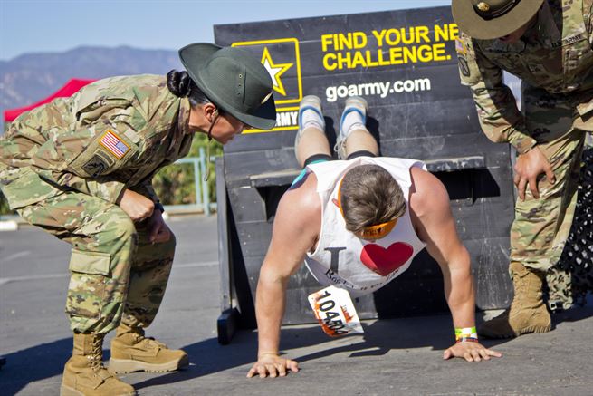 LAKE ELSINORE- Calif. (October 8, 2016) - Sgt. 1st Class Jhoana Arriaga, Charlie Company 2-413th Drill Sergeant Battalion, and other Drill Sergeants motivate competitors in the Army Fitness Challenge at the SoCal Tough Mudder. 

(US Army photo by Cpl. Timothy Yao)