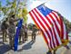 U.S. Army Reserve Sgt. 1st Class Daniel Bulla (behind flag), and Sgt. Gerald Willis - both members of the 335th Signal Command (Theater) color guard -  case the American flag after a change of command ceremony at Fort McPherson, Ga., Oct. 15, 2016. (U.S. Army photo by Staff Sgt. Ken Scar)