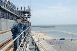 USS Frank Cable File Photo:  Sailors assigned to the submarine tender(AS 40), man the rails while pulling into Colombo, Sri Lanka. The visit is aimed at building friendship and goodwill between the U.S. and the people of Sri Lanka. Frank Cable is one of two forward-deployed submarine tenders and is on a scheduled deployment in the U.S. 7th Fleet area of operations to conduct maintenance and support of deployed U.S. naval force submarines and surface vessels in the Indo-Asia-Pacific region. 