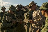 U.S. Marine Corps Staff Sgt. Shaun Garvey, sniper platoon sergeant, 1st Battalion, 7th Marine Regiment, shows soldiers from the Singapore Armed Forces his M40A6 sniper rifle prior to a known distance rifle range as part of Exercise Valiant Mark 2016 at Marine Corps Air-Ground Combat Center Twentynine Palms, Calif. Oct. 1, 2016. This is the 25th year that U.S. Marines and the Singapore Armed Forces have met for Valiant Mark, which improves and maintains a high level of interoperability, enhanced military to military relations and to enriches mutual combat capabilities through combined training.