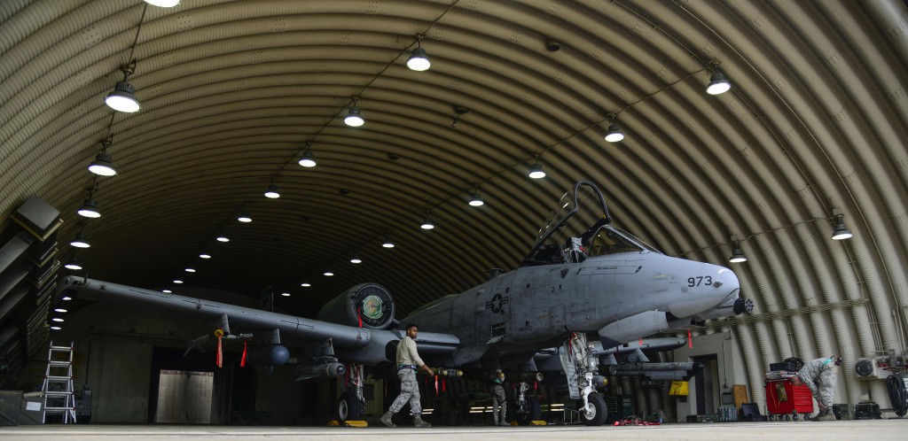 Airmen from the 25th Aircraft Maintenance Unit load munitions onto an A-10 Thunderbolt II during the Vigilant Ace 16 exercise on Osan Air Base, Republic of Korea, Nov. 1, 2015. Exercises such as this help test team Osan's ability to survive and operate in wartime constraints. The weapons Airmen from the 25th AMU are responsible for 10 varieties of conventional munitions that can be loaded onto the A-10 frame. (U.S. Air Force photo by Senior Airman Kristin High/Released)