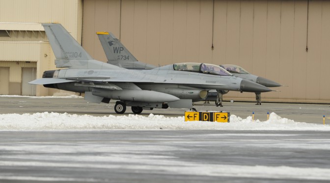 A South Korean KF-16 Fighting Falcon from Seosan Air Base, Republic of Korea, and an F-16 from Kunsan Air Base, ROK, taxi together during a Red Flag exercise at Eielson Air Force Base, Alaska, Oct. 9, 2014. This exercise marks the first time the Republic of Korea Air Force’s KF-16s have participated in RED FLAG-Alaska. (U.S. Air Force Photo by Senior Airman Taylor Curry/Released)