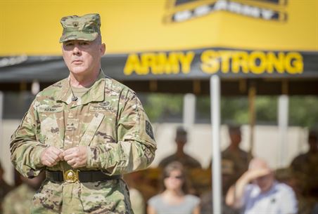 U.S. Army Reserve Brig. Gen. Christopher R. Kemp, outgoing commander of the 335th Signal Command (Theater), speaks to the Soldiers on the parade field during his change of command ceremony at Fort McPherson, Ga., Oct. 15, 2016. Kemp relinquished command of the 335th to Brig. Gen. (Promotable) Peter A. Bosse at the ceremony. (U.S. Army photo by Staff Sgt. Ken Scar)