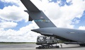 A Transportation Isolation System is loaded onto a C-17 Globemaster III aircraft during Exercise Mobilty Solace at Joint Base Charleston, South Carolina.