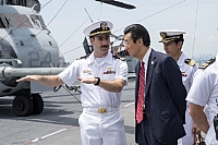161018-N-AW868-113 
SINGAPORE (Oct. 18, 2016) Lt. Hunter Scott discusses flight deck operations with Ambassador of Japan to Singapore Kenji Shinoda during a ship tour aboard amphibious assault ship USS Bonhomme Richard (LHD 6). During the tour, Shinoda visited several spaces to learn more about Bonhomme Richard's amphibious capabilities and sat down with Commander, U.S. Amphibious Force 7th Fleet Rear Adm. Marc Dalton for an office call. (U.S. Navy photo by Chief Ryan G. Wilber/Released)