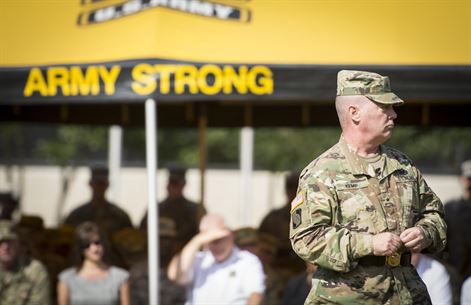 U.S. Army Reserve Brig. Gen. Christopher R. Kemp, outgoing commander of the 335th Signal Command (Theater), speaks to the soldiers on the field during his change of command ceremony at Fort McPherson, Ga., Oct. 15, 2016. Kemp relinquished command of the 335th to Brig. Gen. (Promotable) Peter A. Bosse at the ceremony. (U.S. Army photo by Staff Sgt. Ken Scar)