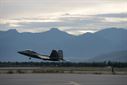 An F-22 Raptor takes off during Red Flag-Alaska at Joint Base Elmendorf-Richardson, Alaska, Aug. 10, 2015. RF-A is an exercise that provides joint offensive counter-air, interdiction, close air support and large force employment training in a simulated combat environment. More than 20 allied countries have participated in RF-A since its conception, improving integration, interoperability and cross-cultural competence. (U.S. Air Force photo/Staff Sgt. Cody H. Ramirez)