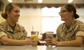 Marines, Cpl. Rebecca D. Elmy, from Wilkes-Barre, Pennsylvania (left), and Pfc. Jessica N. Etheridge, from Longview, Texas (right), enjoy smoothies at the 12th Marines Mess Hall on Camp Hansen, Okinawa, Japan. (U.S. Marine Corps photo by Lance Cpl. Mandaline Hatch)