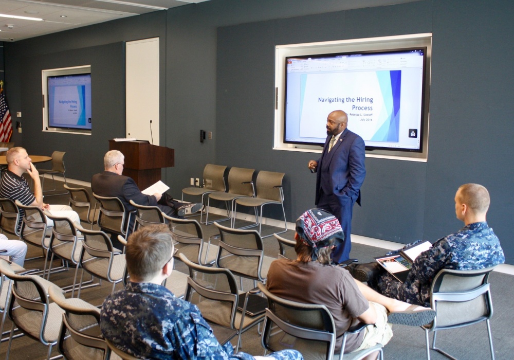 George Odom, a FEMA representative, shares his experience transitioning out of the military at a Navy Wounded Warrior Safe Harbor workshop July 22. (Photo By Andrew Damstedt)