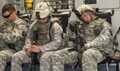 Army Soldiers catch a few minutes of sleep on board an Air Force C-17 Globemaster III. 