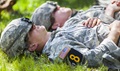 U.S. Army Rangers, rest for a moment in between events during the Best Ranger Competition 2016, at Fort Benning, Ga., April 16, 2016. The competition is a three-day event consisting of challenges that test competitor's physical, mental, and technical capabilities. The Rangers compete for nearly sixty hours with little or no sleep, and must rest intermittently for minutes at a time while waiting to begin their next event. (U.S. Army photo by Staff Sgt. Justin P. Morelli)