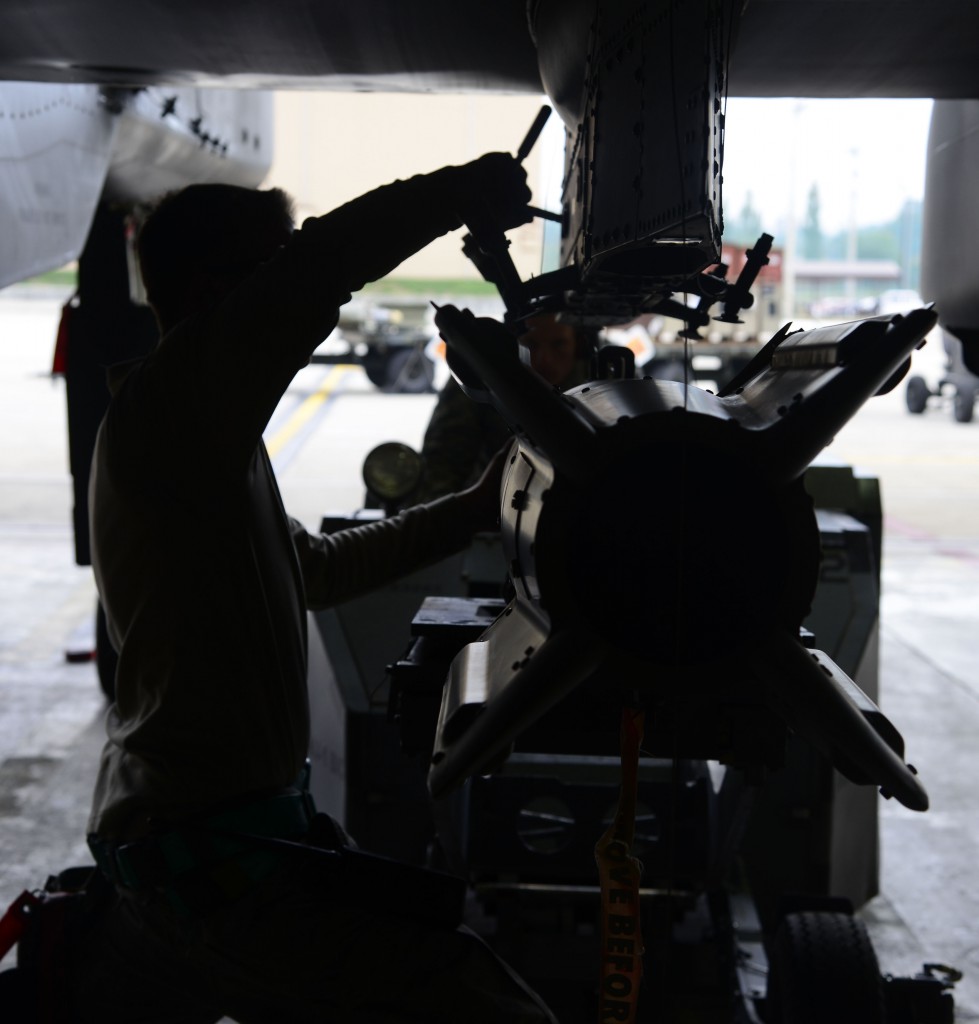 Staff Sgt. Christopher Uecker, 25th Aircraft Maintenance Unit weapons load crew team chief, tightens a guided bomb unit onto an A-10 Thunderbolt II during the Vigilant Ace 16 exercise on Osan Air Base, Republic of Korea, Nov. 1, 2015. The A-10 can hold up to 16,000 pounds of mixed ordnance, employing a wide variety of conventional munitions including general purpose bombs, cluster bomb units, laser guided bombs, joint direct attack munitions, rockets, illumination flares and the 30 millimeter cannon, capable of firing 3,900 rounds per minute. (U.S. Air Force photo/Senior Airman Kristin High/Released)