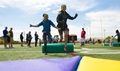 Children at Marine Corps Air Ground Combat Center participate in an obstacle course for Healthy Kids Day April 30. The event was hosted by the Armed Services YMCA at Felix Field (Official Marine Corps photo by Lance Cpl. Dave Flores/Released). 