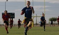 Youth participate in a flag football game on Marine Corps Air Station in Yuma, Arizona. (U.S. Marine Corps photo by Sgt. Travis Gershaneck)