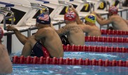 Retired U.S. Army Staff Sgt. Michael Kacer, left, prepares for the 50-meter backstroke race during the swimming portion of the Invictus Games 2014 in London Sept. 14, 2014. The Invictus Games are the United Kingdom's version of the Warrior Games, bringing together wounded veterans from 14 nations for events including track and field, archery, wheelchair basketball, road cycling, indoor rowing, wheelchair rugby, swimming, sitting volleyball and a driving challenge. (DoD photo by Senior Airman Justyn M. Freeman, U.S. Air Force/Released)