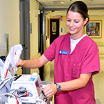 Nurse with machine at hospital
