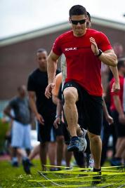 U.S. Air Force 1st Lt. Dave Earl participates in an event at the annual Squadron Fitness Challenge at Langley Air Force Base, Va., May 24, 2012. (U.S. Air Force photo by Airman 1st Class Kayla Newman)