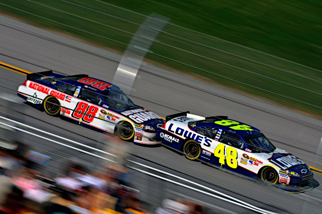 Dale Earnhardt Jr., driver of the No. 88 National Guard racecar, pushes or â€˜bump draftsâ€™ teammate Jimmie Johnson during the race at Talladega Superspeedway in Talladega, Ala. April 17, 2011. Earnhardt finished fourth and moved up three positions in the points race. (Photo courtesy of Hendrick Motor Sports)(Released)