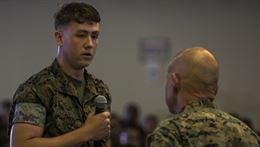 Pfc. Lucas Smith asks Gen. Robert B. Neller a question during his visit to Camp Kinser, Okinawa, Japan, October 13, 2016. Neller is visiting III Marine Expeditionary Force to reinforce the importance of every Marine and Sailor and their role in continuing the mission of the ‘Fight Tonight’ MEF. Whether responding to a crisis or natural disaster, III MEF continues to train to ensure its capabilities in keeping peace and security throughout the region. “I’m not looking to pick a fight with anybody, but you need to be ready to go,” said Neller. Neller, from East Lansing, Michigan, is the commandant of Marine Corps. Smith, from Cleveland, Ohio is a warehouse clerk at 3rd Supply Battalion, 3rd Supply Company, III Marine Logistics Group, III MEF.