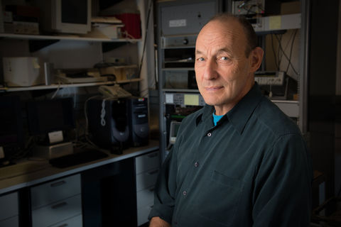 
Mathematician Marc Weiss in the NIST Boulder laboratory that controls an experimental demonstration of time transfer over commercial telecommunications networks. In the experiment, equipment in this room locks onto NIST’s official version of international time, transfers time signals back and forth between NIST and U.S. Naval Observatory time services in Colorado Springs, and measures system time transfer accuracy.
 Credit:   Paul Trantow/Altitude Arts for NIST 