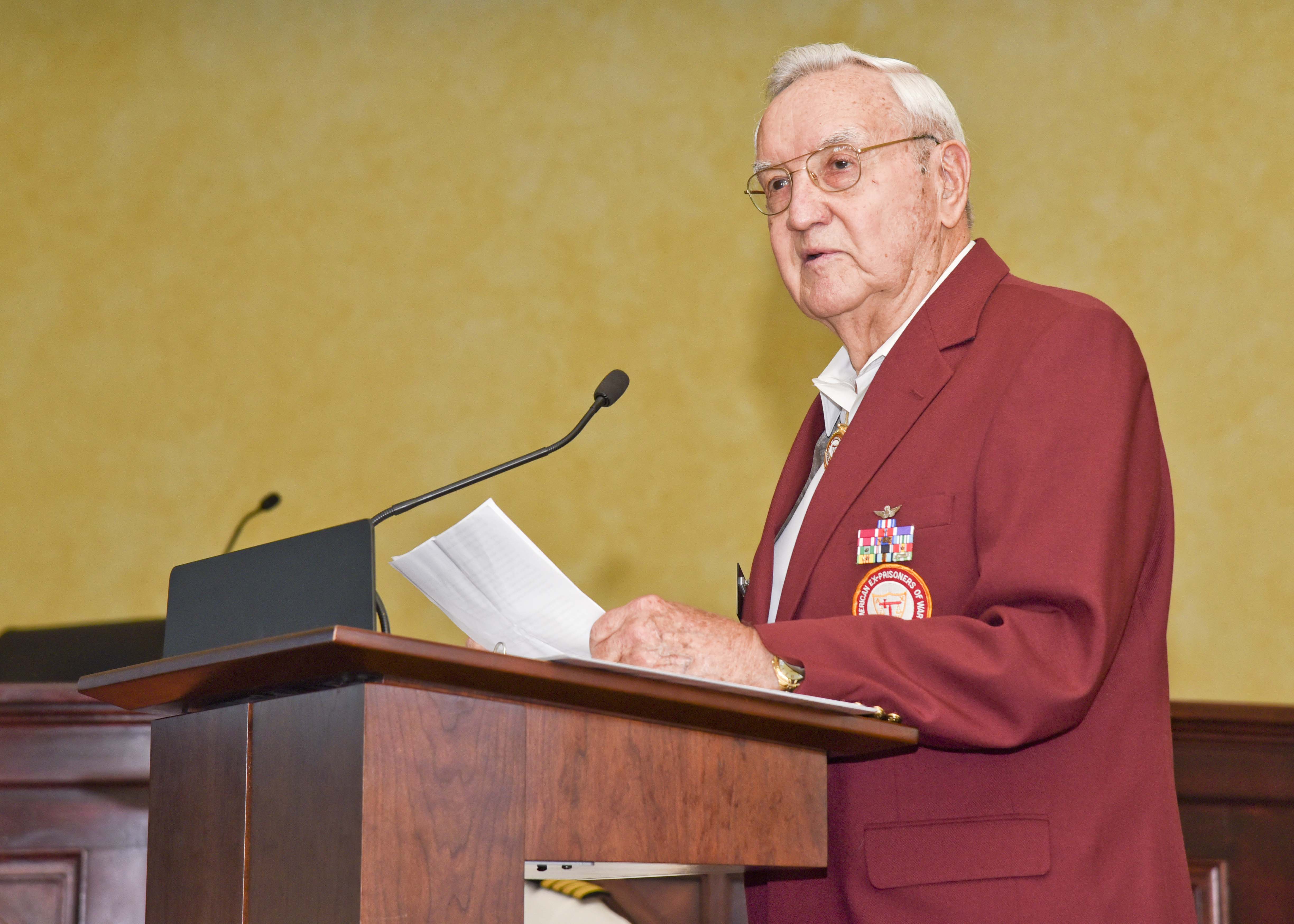 160915-N-CH038-029 -- Retired U.S. Army Col. Quin Herlik speaks at a ceremony for prisoners of war and military members missing in action at the City Hall of Meridian, Sept. 15. Military members from each branch participated in the ceremony including NAS Meridian leadership and students from the Naval Technical Training Center and Marine Aviation Training Support Squadron One.  (U.S. Navy photo by MC2 Chris Liaghat/Released)