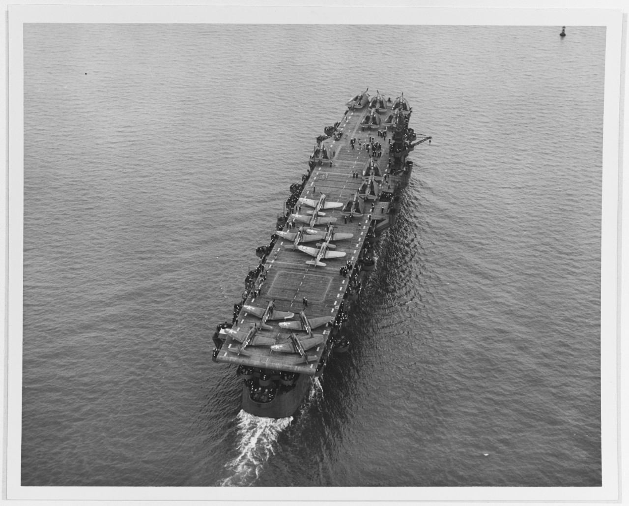 USS Independence (CVL-22) In San Francisco Bay, California, on 15 July 1943, the day her hull number was changed from CV-22 to CVL-22. She has nine SBD scout bombers parked amidships and aft, and nine TBM torpedo planes parked amidships and forward. Official U.S. Navy Photograph, now in the collections of the National Archives