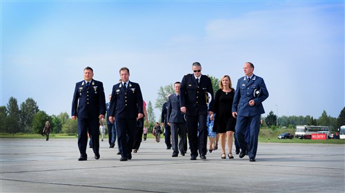 Senior national representatives prepare to welcome a group of distinguished visitors at Papa Air Base, Hungary July 27. Papa AB hosted the Heavy Airlift Wing's (HAW) third anniversary. The HAW is an operational unit of the Strategic Airlift Capability (SAC) program which is designed to fulfill the strategic airlift requirements of the following nations; Norway, Poland, Romania, Slovenia, Bulgaria, Estonia, Hungary, Lithuania, the Netherlands and USA and two Partnership for Peace (PFP) nations, Sweden and Finland. 