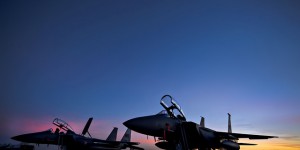 Two F-15E Strike Eagles sit on the flightline ready for exercise Red Flag 14-1