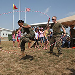 Service members jumping rope