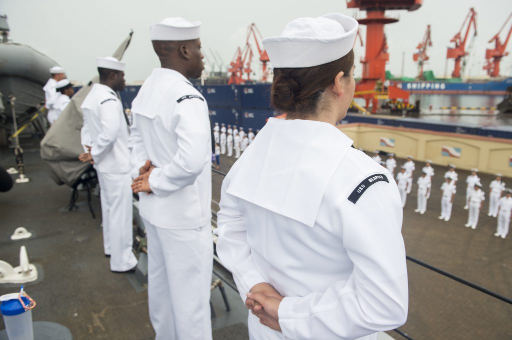 QINGDAO, China (August 8, 2016) Sailors aboard the Arleigh Burke-class guided-missile destroyer USS Benfold (DDG 65) man the rails while pulling in for a port visit. U.S. Navy photo by Mass Communication Specialist 3rd Class Deven Leigh Ellis/Released 