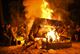 Officers from various fighter squadrons lift a piano into a burning pit Sept. 23, 2016, at Seymour Johnson Air Force Base, N.C. Pianos are burned every year in memory of the Battle of Britain, which took place during World War II, and those pilots who never came home. (U.S. Air Force photo/Airman Shawna L. Keyes)