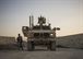 Senior Airman Michael Van Deusen, of the 455th Expeditionary Security Forces Squadron quick reaction force, gets out of a mine-resistant, ambush-protected vehicle during a patrol at Bagram Airfield, Afghanistan, Sept. 27, 2016. MRAPs are used by the 455th ESFS to secure the flightline. (U.S. Air Force photo/Senior Airman Justyn M. Freeman)