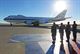 Base leaders salute Defense Secretary Ash Carter’s aircraft at Minot Air Force Base, N.D., Sept. 26, 2016. Carter spoke with Airmen from the 5th Bomb and 91st Missile Wings and toured several facilities to include a missile alert facility and a B-52H Stratofortress static display. (U.S. Air Force photo/Airman 1st Class J.T. Armstrong)