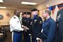 Col. D.D. Mayfield, left, hands out his Defense Contract Management Agency-Chicago command coin to members of the 85th Support Command&#39;s color guard team during a change of command ceremony on June 23, 2016.
The color guards team supported various organization functions for DCMA during Mayfield&#39;s command.
(Photo by Mr. Anthony L. Taylor)