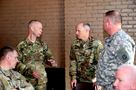 Command Sgt. Maj. Jeffrey Dillingham, center right, Command Sergeant Major, First Army Division West based in Fort Hood, Texas, converses with Army Reserve soldiers from the 85th Support Command&#39;s headquarters staff during a site visit here, June 30, 2016.
(Photo by Mr. Anthony L. Taylor)