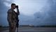 Airman 1st Class Jose Olivera, an 18th Security Forces Squadron response force member, scans the flightline with binoculars Sept. 27, 2016, at Kadena Air Base, Japan. By maintaining constant watch over flightline assets, Olivera helps prevent unauthorized activity from hindering aircraft operations. (U.S. Air Force photo/Senior Airman Peter Reft)