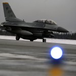 An F-16 Fighting Falcon from Kunsan Air Base, Republic of Korea, taxis during RED FLAG-Alaska 15-1 at Eielson Air Force Base, Oct. 14, 2014. This field training exercise is focused on improving the combat readiness of U.S. and international forces and providing training for units preparing for air expeditionary force tasking. (U.S. Air Force photo by Senior Airman Taylor Curry/Released)