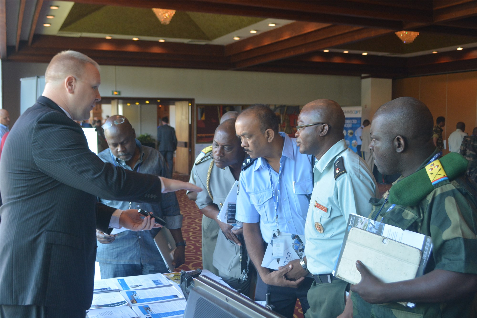 Africa Endeavor 16 participants listen to a technology expo representative talk about various Command, Control, Communications and Computer Systems (C4) solutions 18 Aug., 2016.  AE16 is an annual U.S. Africa Command sponsored training and information sharing effort to help develop African multi-national communication interoperability for African Union and United Nations mandated peacekeeping and disaster response in Africa.  Over 40 African nations participated in this year's events