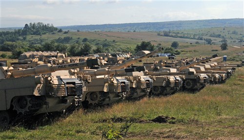 CINCU, Romania – Tanks belonging to the 116th Cavalry Brigade Combat Team (CBCT), Idaho Army National Guard are positioned at the Romanian Land Force Combat Training Center (RLF-CTC) in Cincu, July 7, 2016 prior to the start of Exercise Saber Guardian 2016. The vehicles arrived in Romania on June 19 at the Port of Constanta and were shipped via railhead to Cincu. Saber Guardian is a U.S. Army Europe-led exercise, in the spirit of Partnership for Peace. It is designed to promote regional stability and security, while strengthening partnership capacity, and fostering trust while improving interoperability between Romania, the U.S., NATO and Partnership for Peace member nations. The 116th CBCT is one of the U.S. units participating in the exercise, which will also include forces from 11 different countries.