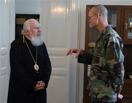 CLU-NAPOKA, Romania &mdash; Air Force Chaplain (Capt.) Eric Boyer, 404th Air Expeditionary Group chaplain, meets Romanian Orthodox Church Archbishop Valeriu Anania during a trip to a cathedral here. The meeting concluded a &#34;spiritual relations&#34; visit between Romanian Military Chaplains and Chaplain Boyer during his deployment to Campia Turzii, Romania in support of Operation Noble Endeavor. (Department of Defense photo by Air Force Tech. Sgt. Eric Petosky)