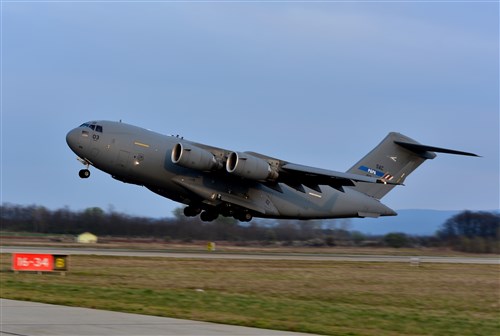 File photo of a Heavy Airlift Wing Boeing C-17 Globemaster taking out in Papa, Hungary to provide strategic airlift capability to meet mission requirements. (Photo by MCS 3rd Class Ville Tuokko) 