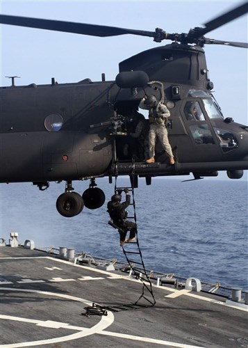 ADRIATIC SEA &mdash; Special Operations Forces with exercise Jackal Stone 2009 conduct a fast roping evolution out of a MH-47 Chinook from the 160th Special Operations Aviation Regiment (Airborne) with USS Higgins (DDG 76).  Exercise Jackal Stone 2009 takes place in various locations throughout Croatia and promotes cooperation and interoperability between special operations forces of 10 participating nations. (U.S. Navy photo by Chief Intelligence Specialist Louis Fellerman)
