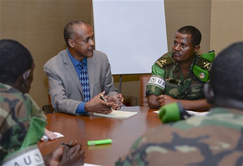Abdulhalim Rijaal, U.S. Department of State program manager for East Africa, discusses challenges, lessons learned and strategies with African Union Mission to Somalia members during the Public Information Officer’s Conference in Djibouti, Aug. 3, 2016. Public information officers attended the conference in Djibouti from Kenya, Uganda, Burundi, Djibouti, Ethiopia and Somalia. (U.S. Air Force photo by Staff Sgt. Benjamin Raughton/Released)