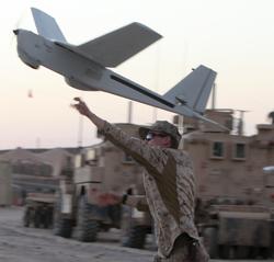 Lance Cpl. Andrew Herring launches the Puma during an operation at Patrol Base Boldak March 4, 2013. (U.S. Marine Corps photo)